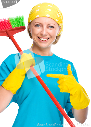 Image of Young woman as a cleaning maid