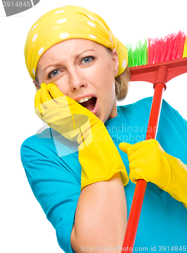 Image of Young woman as a cleaning maid