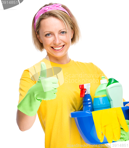 Image of Young woman as a cleaning maid