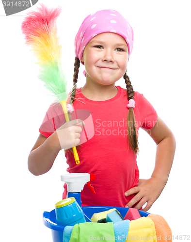 Image of Young girl is dressed as a cleaning maid