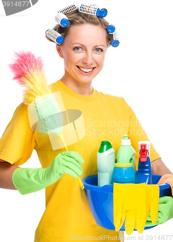 Image of Young woman as a cleaning maid