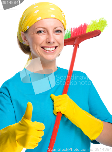 Image of Young woman as a cleaning maid