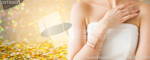 Image of close up of beautiful woman with ring and bracelet