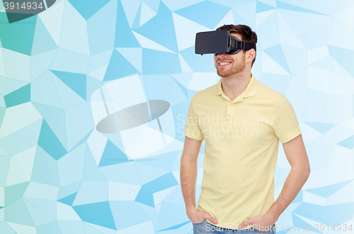 Image of happy man in virtual reality headset or 3d glasses