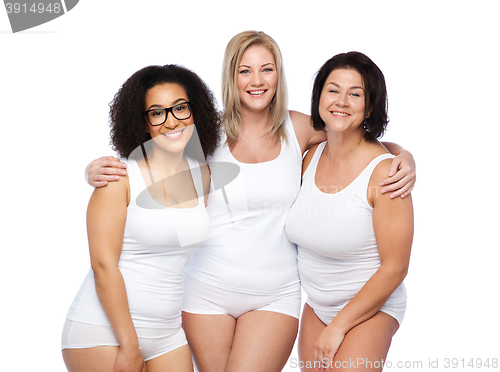 Image of group of happy plus size women in white underwear