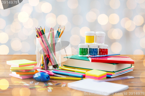 Image of close up of stationery or school supplies on table