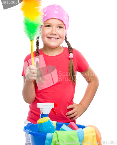 Image of Young girl is dressed as a cleaning maid