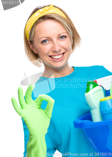 Image of Young woman as a cleaning maid