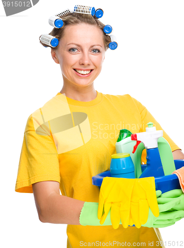 Image of Young woman as a cleaning maid