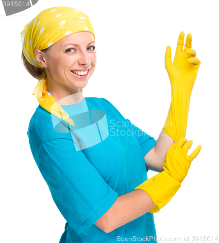 Image of Young woman as a cleaning maid