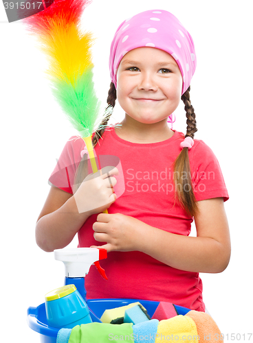 Image of Young girl is dressed as a cleaning maid