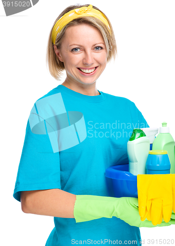 Image of Young woman as a cleaning maid