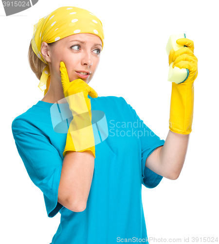 Image of Young woman with sponge