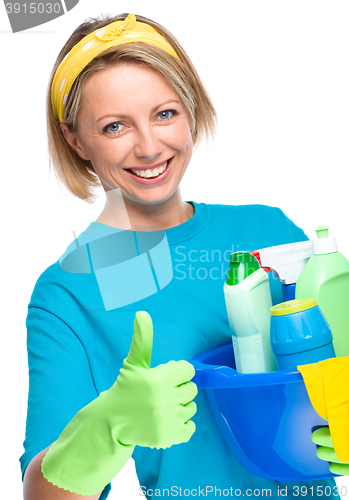 Image of Young woman as a cleaning maid