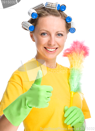 Image of Young woman as a cleaning maid