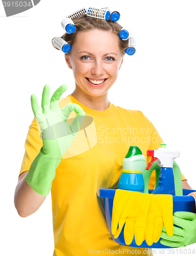 Image of Young woman as a cleaning maid