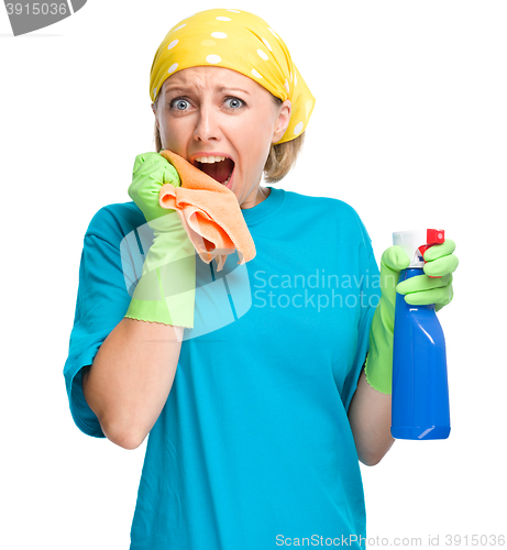 Image of Young woman as a cleaning maid