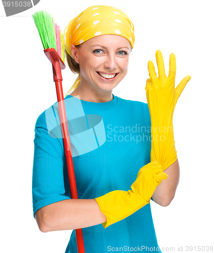 Image of Young woman as a cleaning maid