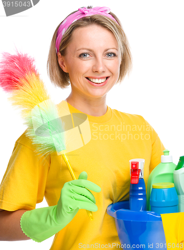 Image of Young woman as a cleaning maid