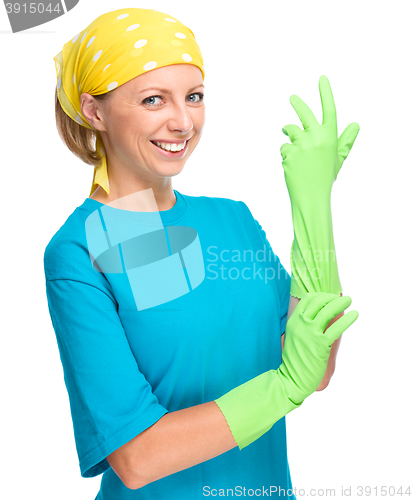 Image of Young woman as a cleaning maid