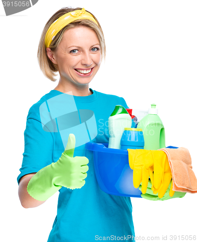 Image of Young woman as a cleaning maid