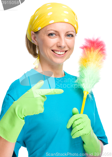 Image of Young woman as a cleaning maid