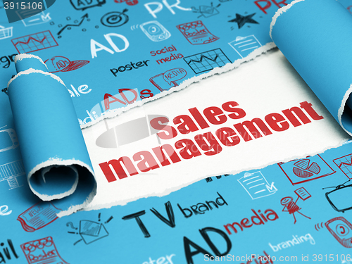 Image of Advertising concept: red text Sales Management under the piece of  torn paper