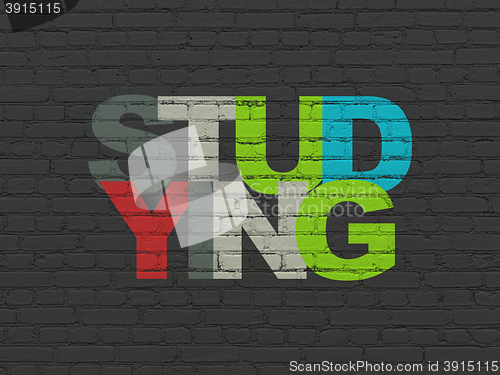 Image of Learning concept: Studying on wall background
