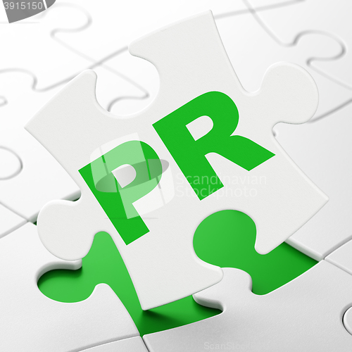 Image of Marketing concept: PR on puzzle background