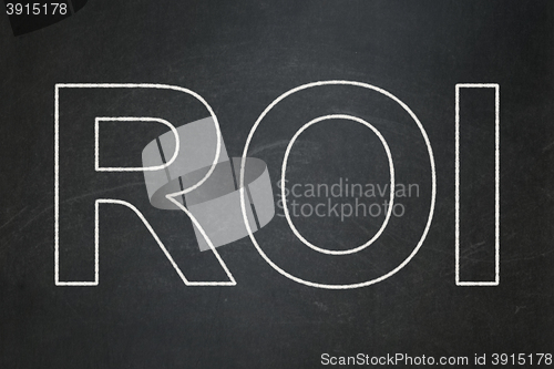 Image of Finance concept: ROI on chalkboard background