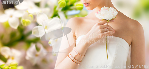 Image of close up of beautiful woman with ring and bracelet