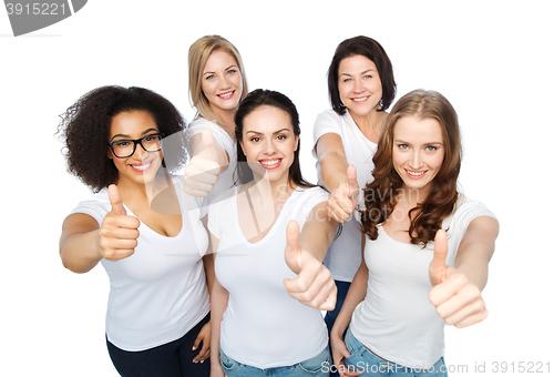 Image of group of happy different women showing thumbs up