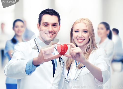 Image of cardiologists with heart