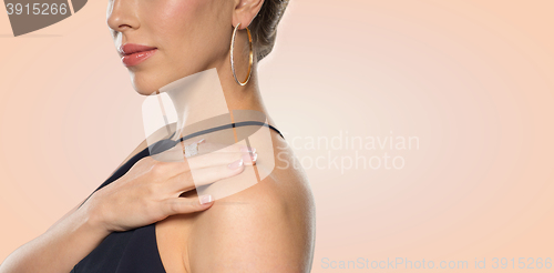 Image of close up of beautiful woman with ring and earring