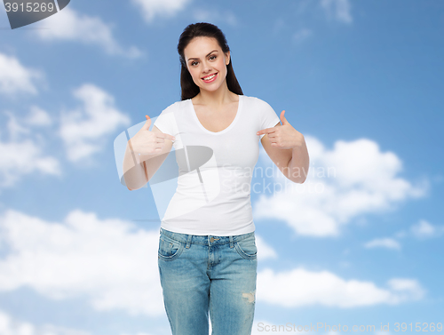 Image of happy young woman or teenage girl in white t-shirt