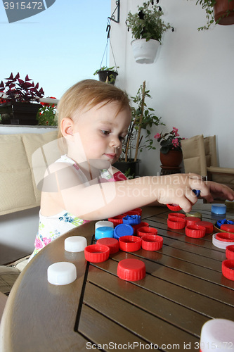 Image of Young girl playing
