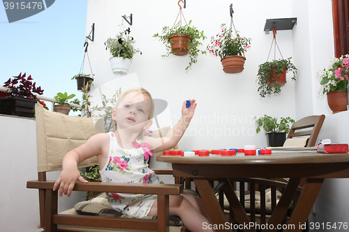 Image of Young girl playing