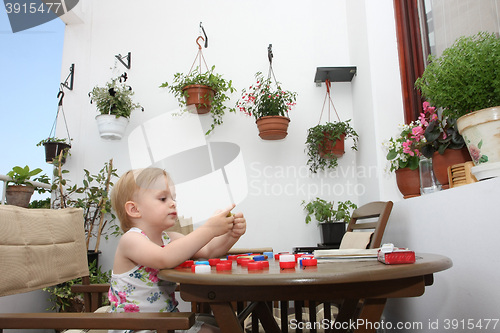 Image of Young girl playing