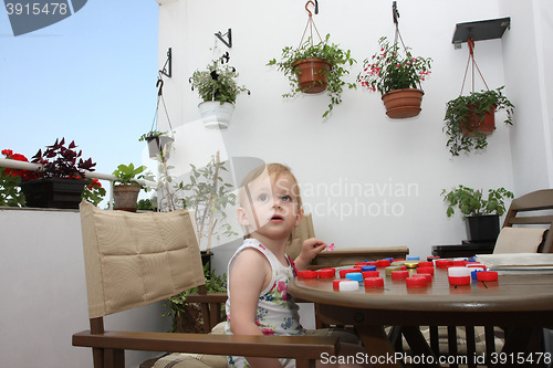 Image of Young girl playing