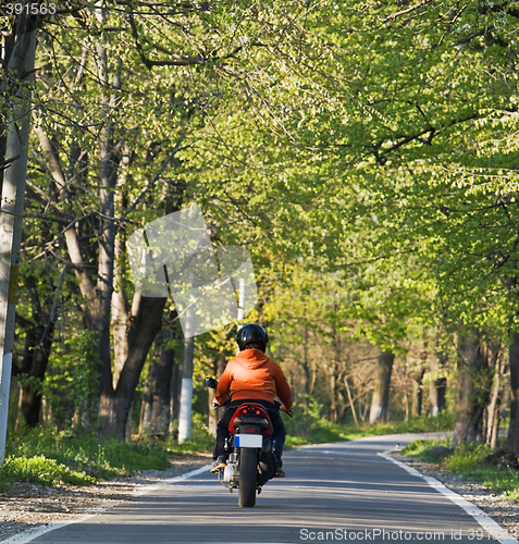 Image of Riding a scooter