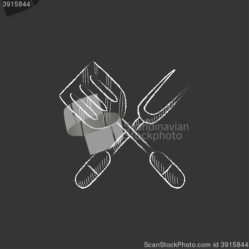 Image of Kitchen spatula and big fork. Drawn in chalk icon.