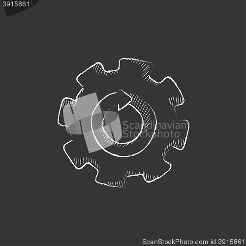 Image of Gear wheel with arrow. Drawn in chalk icon.