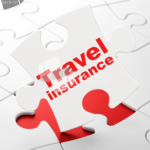 Image of Insurance concept: Travel Insurance on puzzle background