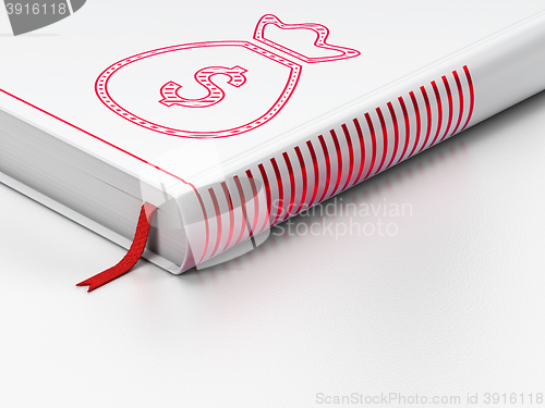 Image of Banking concept: closed book, Money Bag on white background