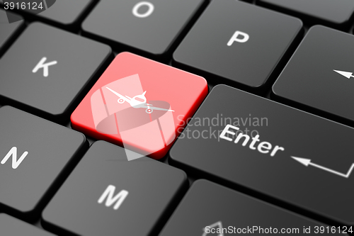 Image of Travel concept: Aircraft on computer keyboard background