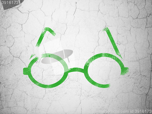 Image of Science concept: Glasses on wall background
