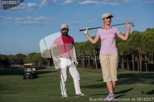 Image of portrait of couple on golf course