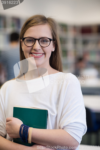 Image of portrait of female student in library