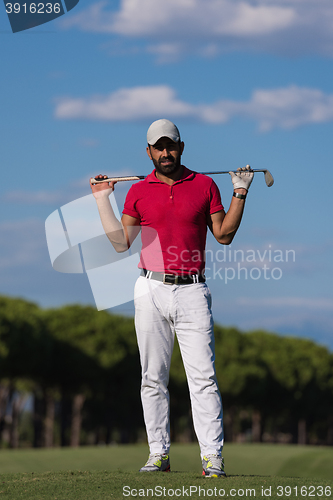 Image of handsome middle eastern golf player portrait at course