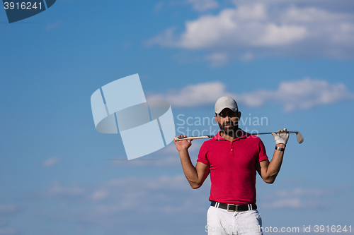 Image of handsome middle eastern golf player portrait at course